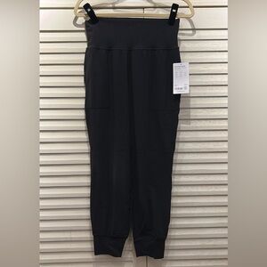 Athleta salutation joggers in black- NWT medium petite